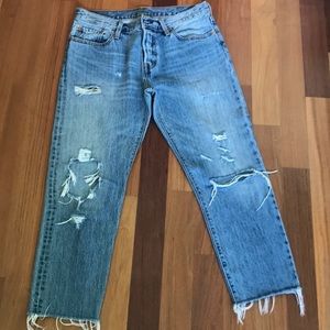 Levi’s 501 distressed cropped jeans